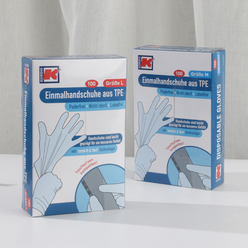 Milieuvriendelijke en zachte Off-white TPE-handschoenen (stippenpatroon) Milieuvriendelijke en zachte Off-white TPE-handschoenen (stippenpatroon)